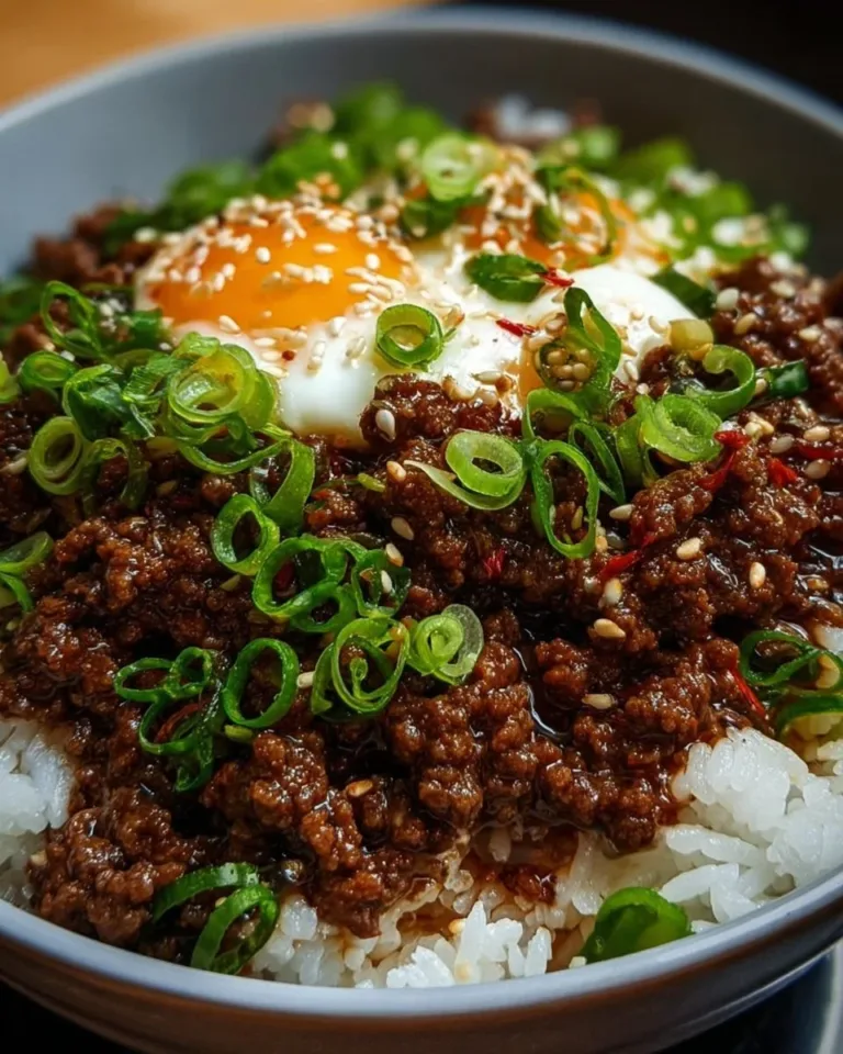 Korean-Style Ground Beef Bowl garnished with vegetables and sesame seeds
