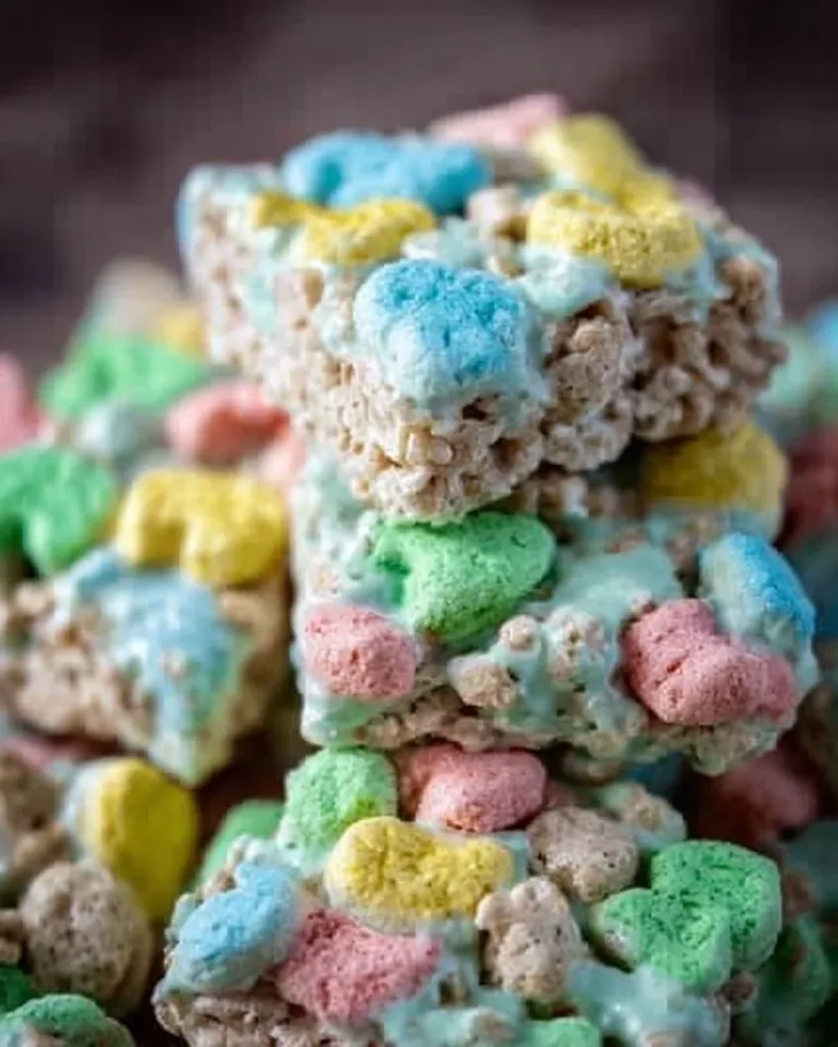 Colorful Lucky Charms Treats made with marshmallows and cereal.